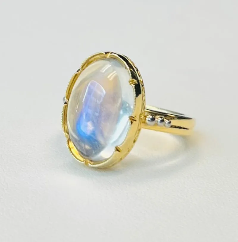 8.70 Carat Oval Blue Flash Moonstone, Yellow Gold, Palladium Dome Ring