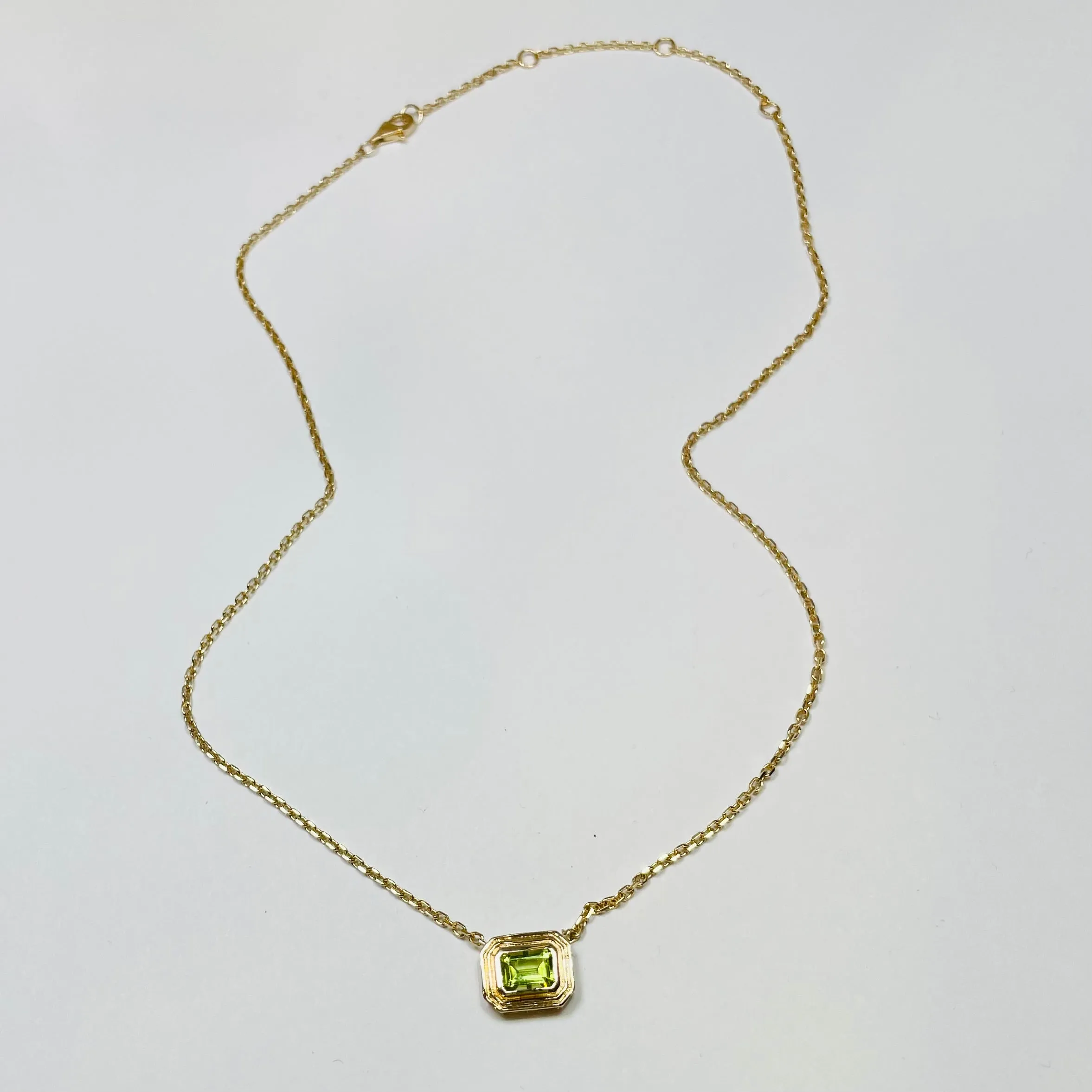 stepped bezel set peridot necklace